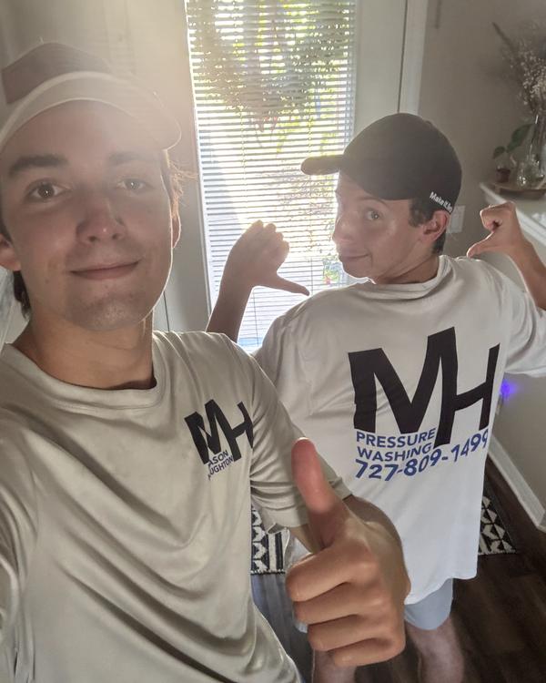 Mason Houghton and Brayden in Houghton Pressure Washing shirts before a job in Hudson, Florida